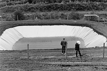 Figure 2. Elevated earthen reservoir with woven polyethylene liner