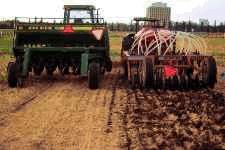 Both a disc drill (left) and an air drill (right) work well for direct seeding into sod.